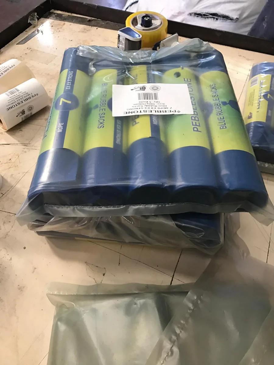 Blue rubble sacks packed in retail bundles
